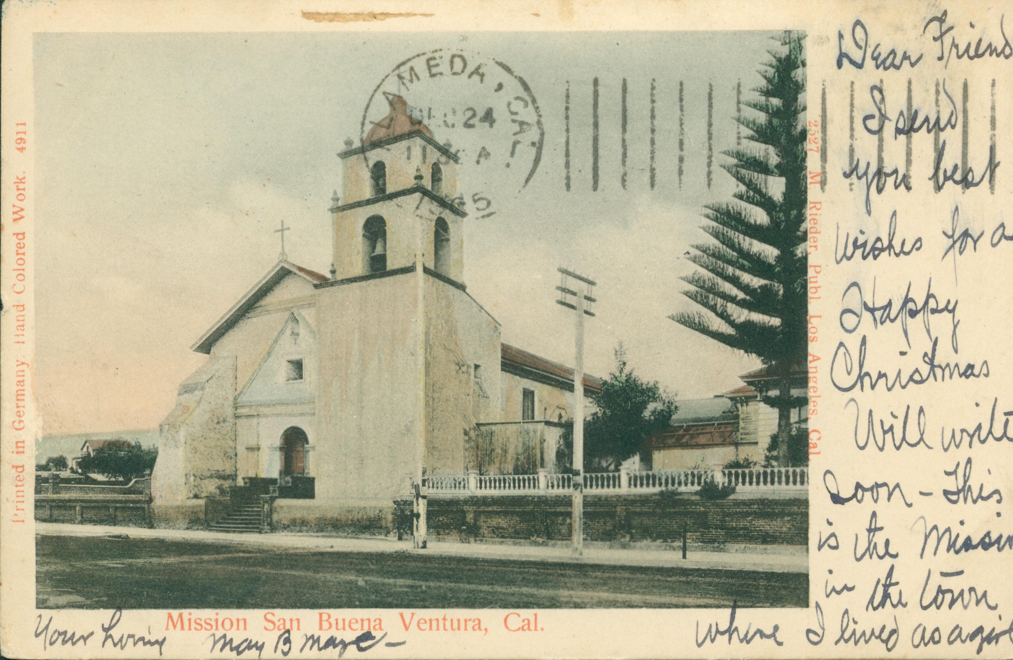 Shows the exterior of the San Buenaventura mission church